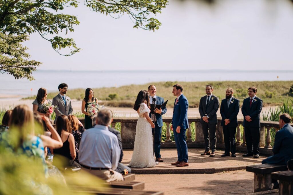 A couple has an intimate outdoor wedding at Harkness Memorial State Park in Connecticut.